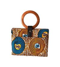 an african print handbag with a wooden handle