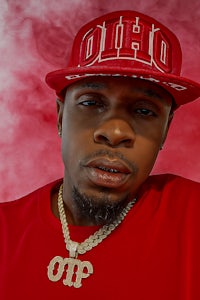 a man wearing a red hat