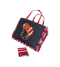 a black and red tote bag with an image of an african woman