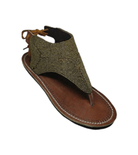 a pair of women's sandals with a beaded strap